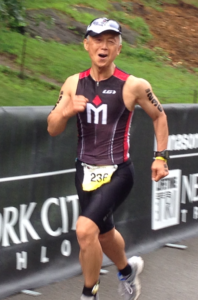 Triathlete running in a race event.