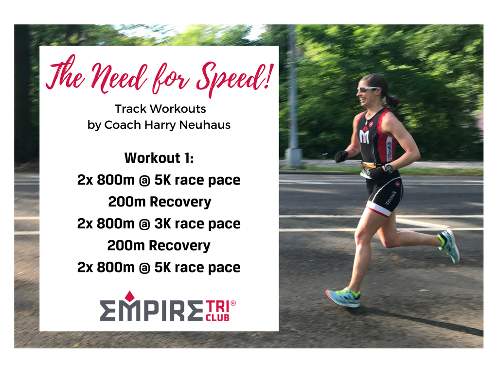 A woman running on the road with a race number.