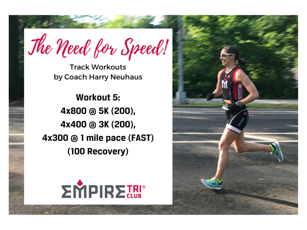 A woman running on the road with a race number.