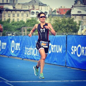 Athlete running in a triathlon race.